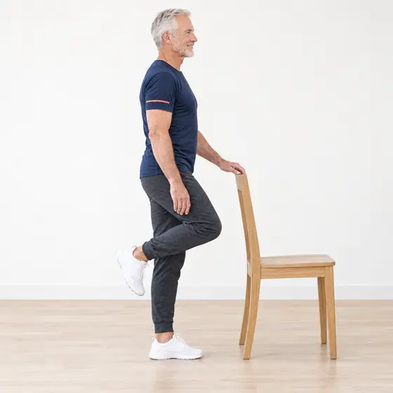 One-Leg Stand: Stand next to the chair, hand on the backrest.