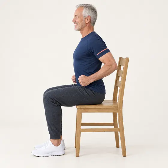 Shoulder Blade Squeeze: Sit tall, bend your elbows to 90 degrees in front of you.