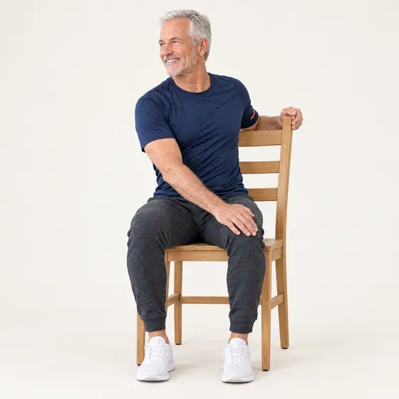 Torso Twist: Sit tall, feet flat.