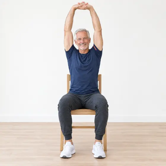 Overhead Reach: Sit tall, interlace your fingers.