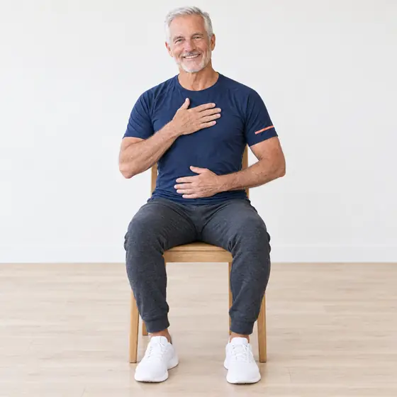 Belly Breathing: Sit tall, one hand on your belly, one on your chest.