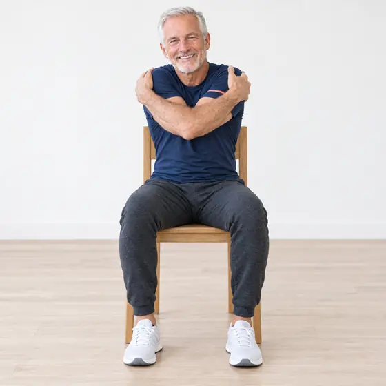 Upper Back Hug: Sit tall and give yourself a big hug.