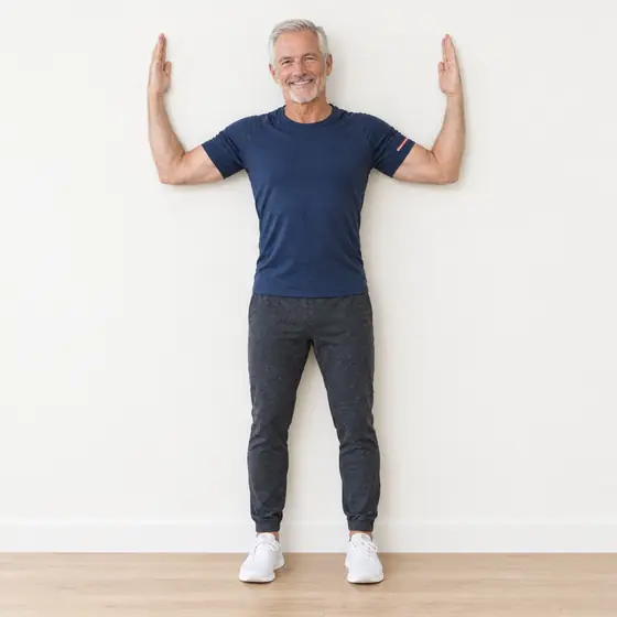 Wall Angels: Stand with your back, head and arms against the wall.